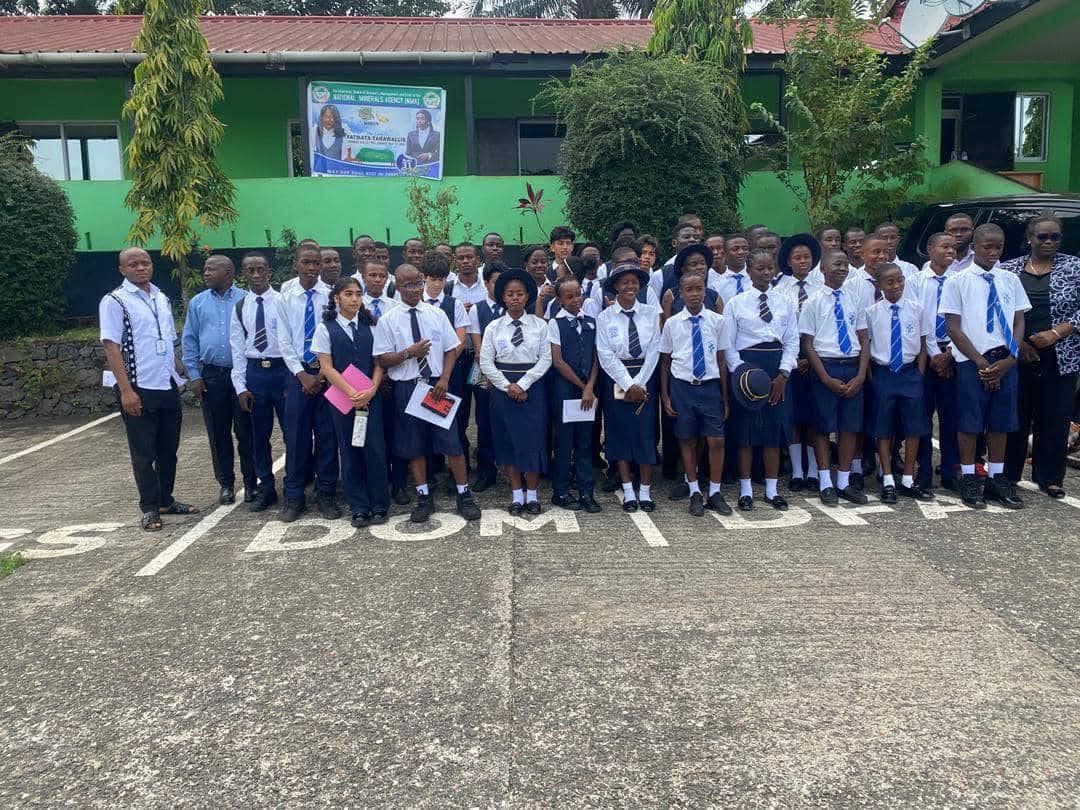 Students in front of the school building